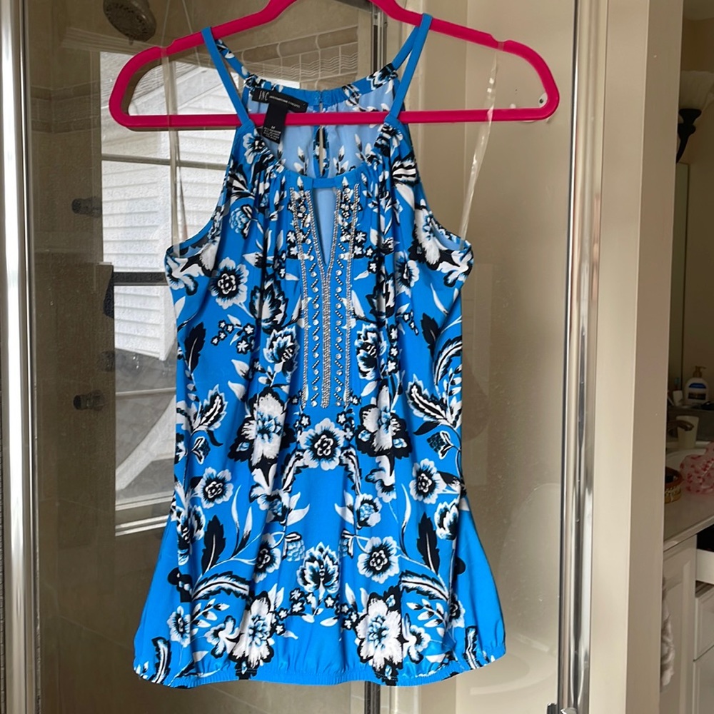 Flattering shape & beautiful color floral toile with inset crystals at neckline